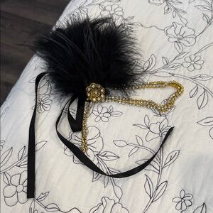 Elegant Black and Gold Feathered Hair Accessory